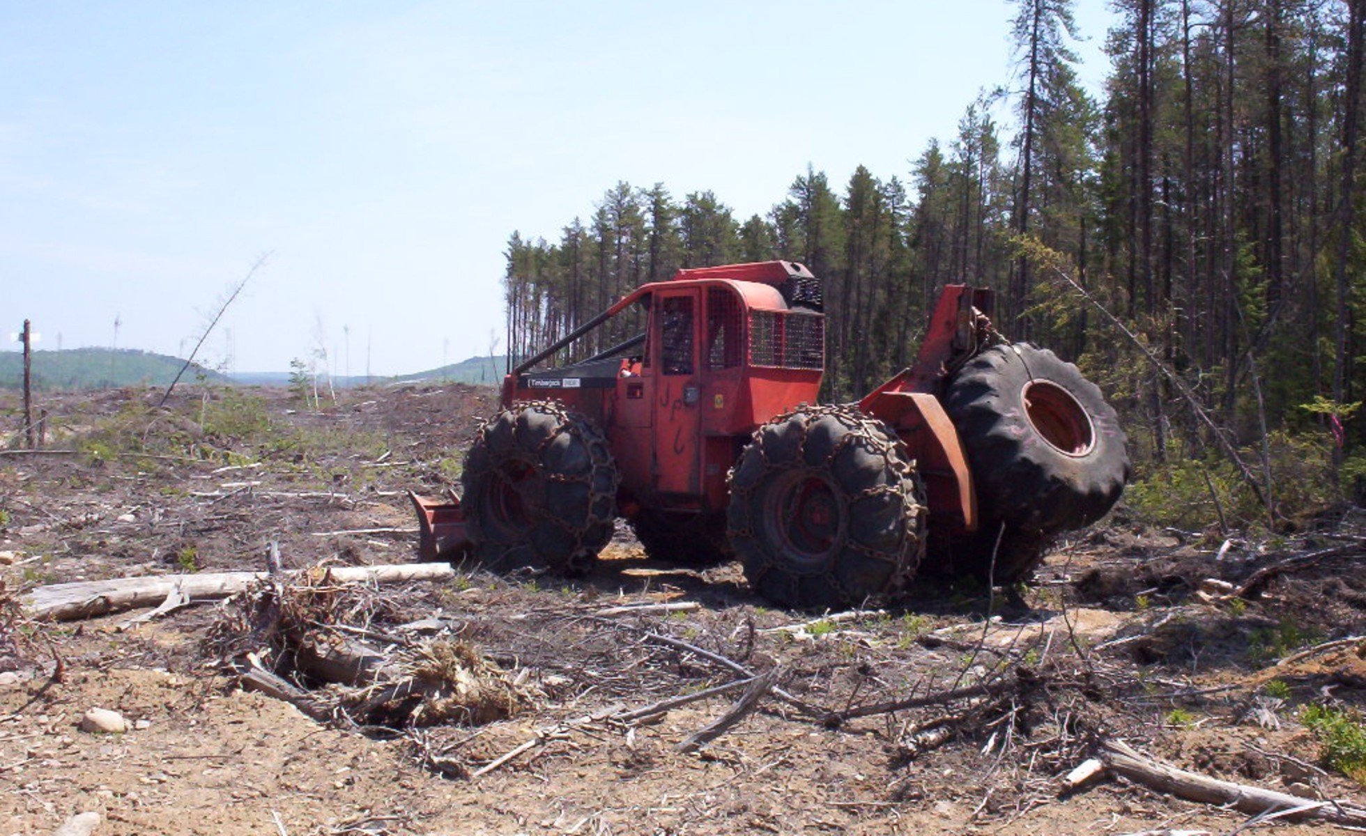 skidder in Quebec boreal forest