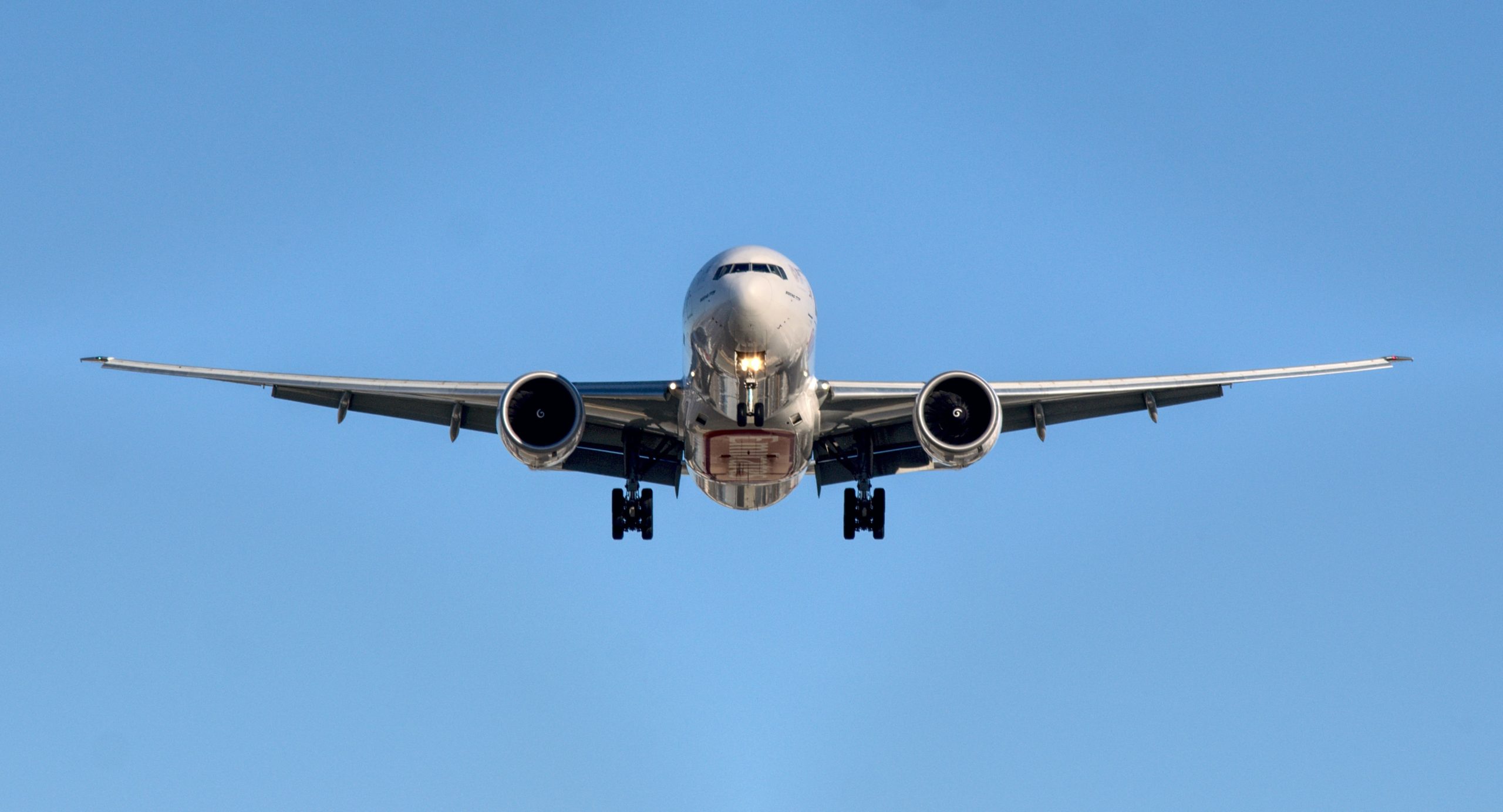 Airplane at mid air at daytime