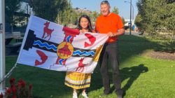 Raising the Tk'emlúps te Secwépemc flag at Kamloops City Hall