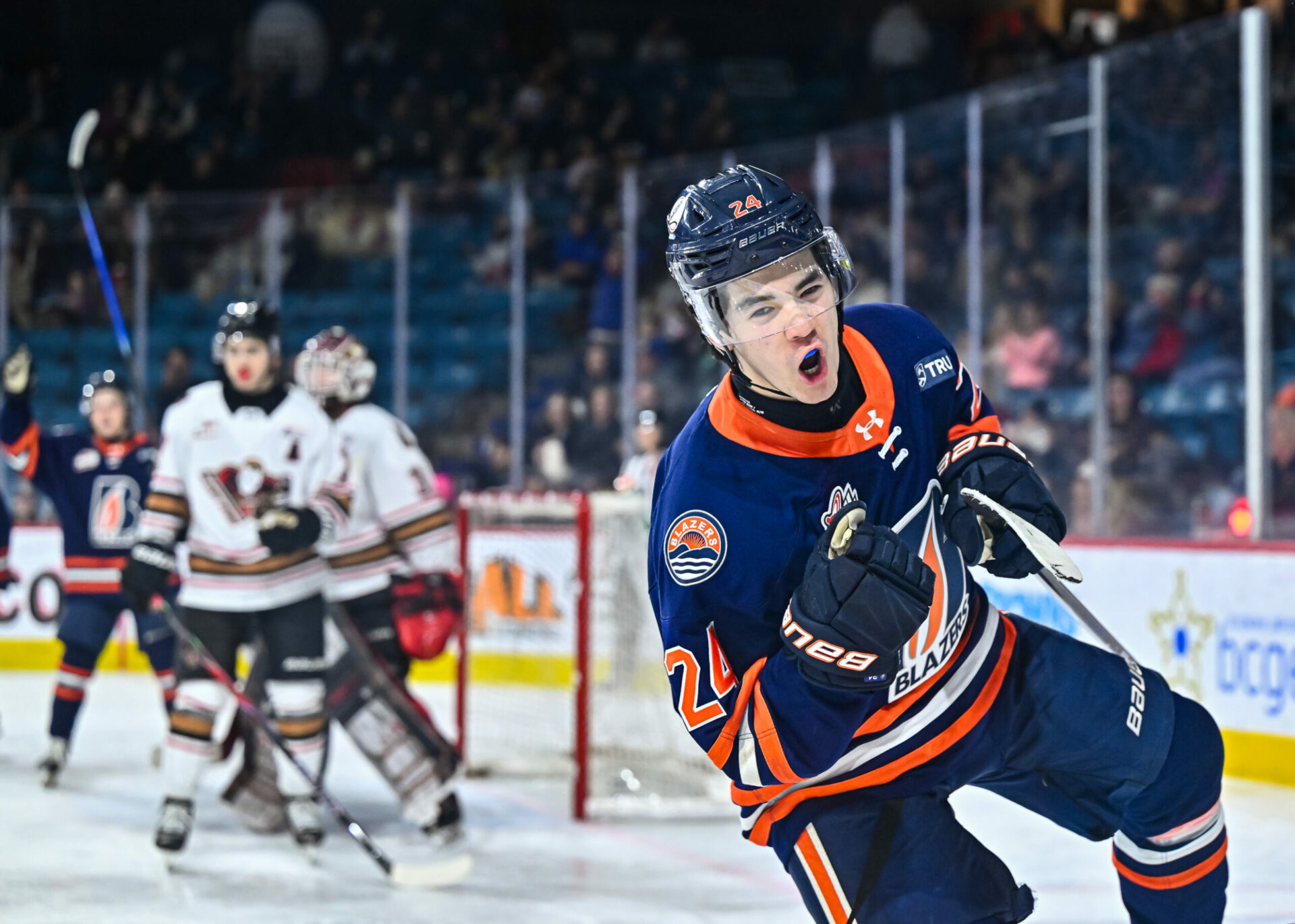 BLAZERS WIN 9-5 OVER HITMEN